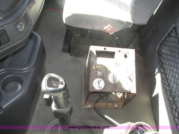 image for item H1179 2002 Volvo VNM water truck