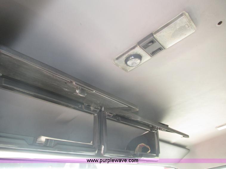 image for item H1179 2002 Volvo VNM water truck