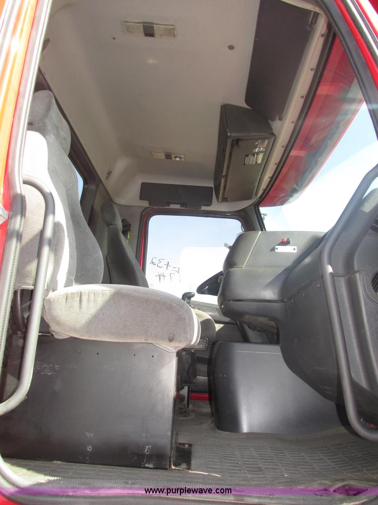 image for item H1179 2002 Volvo VNM water truck