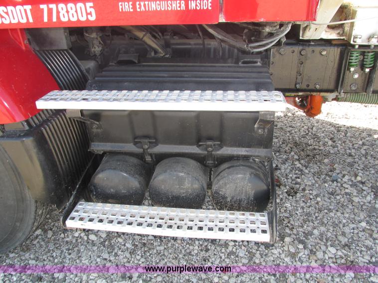 image for item H1179 2002 Volvo VNM water truck