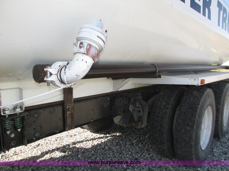 image for item H1179 2002 Volvo VNM water truck