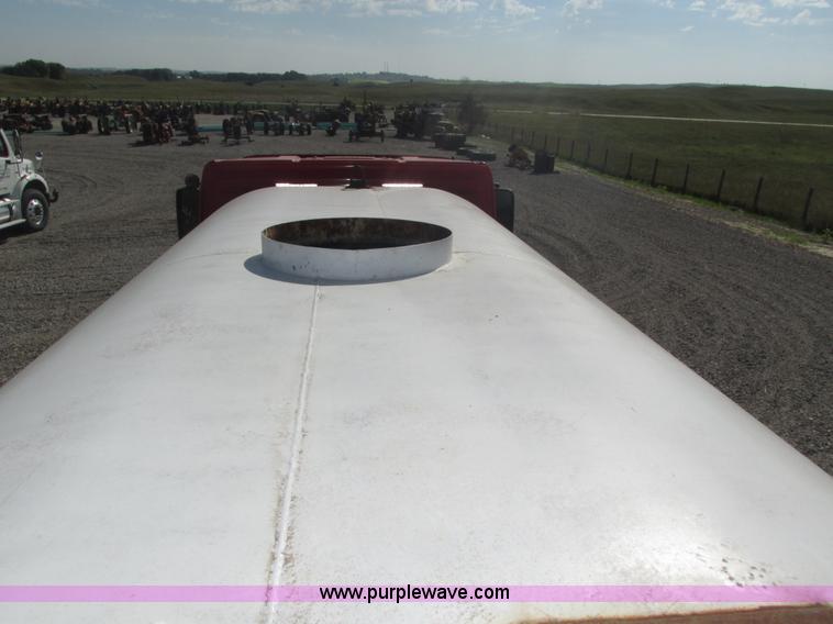 image for item H1179 2002 Volvo VNM water truck