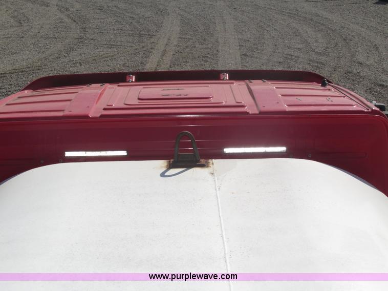 image for item H1179 2002 Volvo VNM water truck