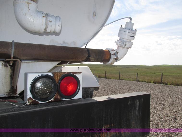 image for item H1179 2002 Volvo VNM water truck