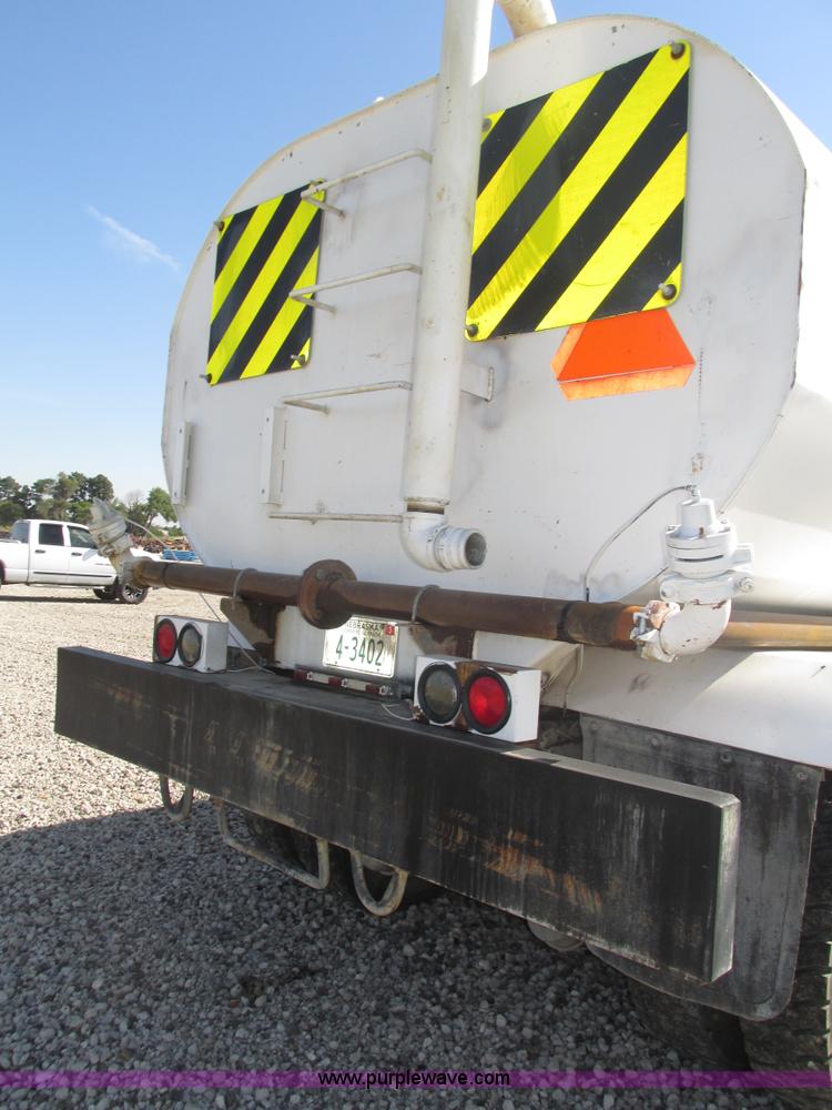 image for item H1179 2002 Volvo VNM water truck