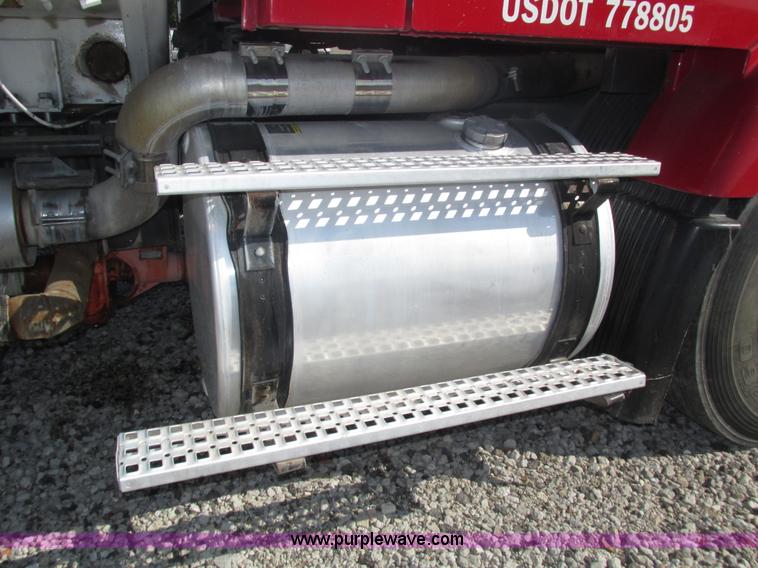 image for item H1179 2002 Volvo VNM water truck