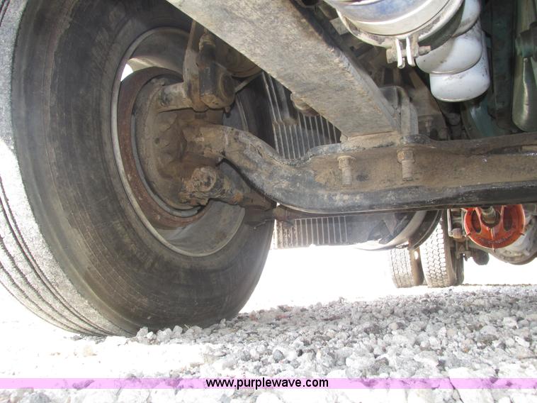 image for item H1179 2002 Volvo VNM water truck