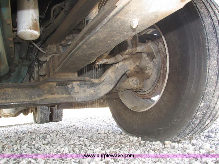 image for item H1179 2002 Volvo VNM water truck