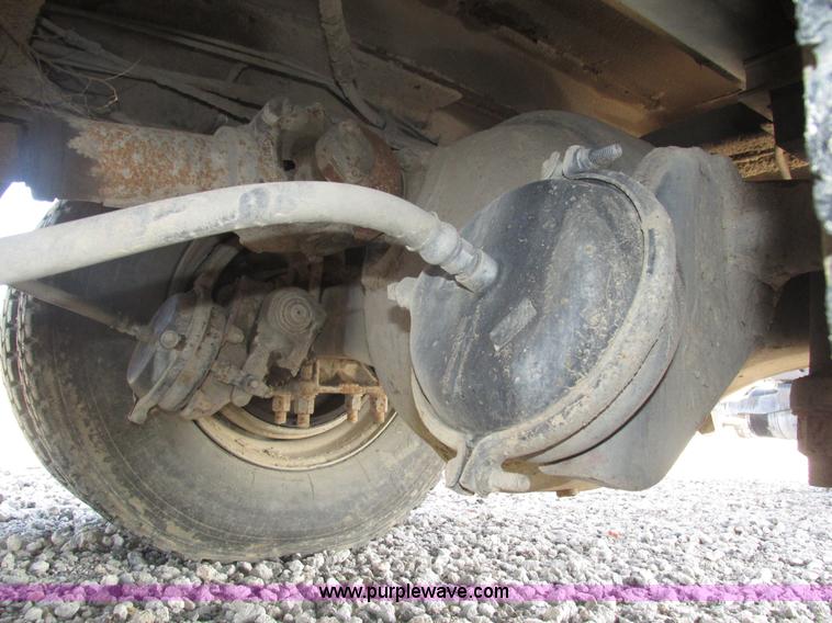 image for item H1179 2002 Volvo VNM water truck