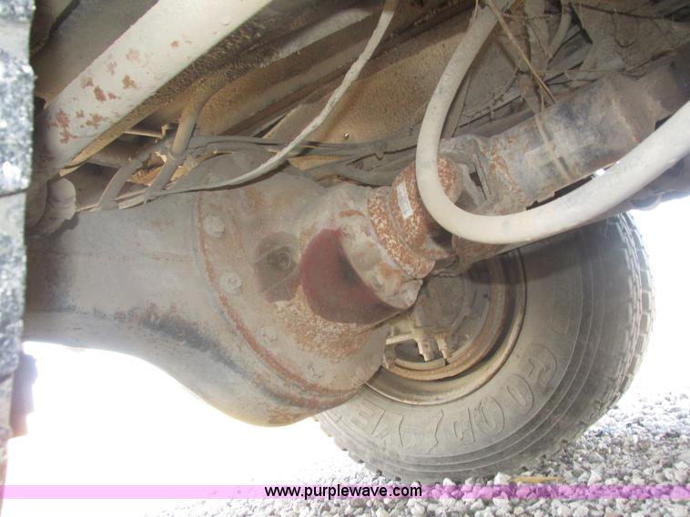 image for item H1179 2002 Volvo VNM water truck