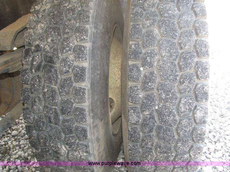 image for item H1179 2002 Volvo VNM water truck