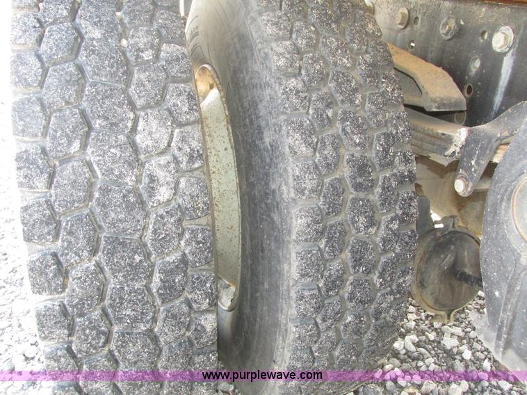 image for item H1179 2002 Volvo VNM water truck