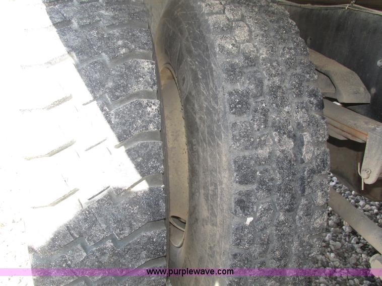 image for item H1179 2002 Volvo VNM water truck