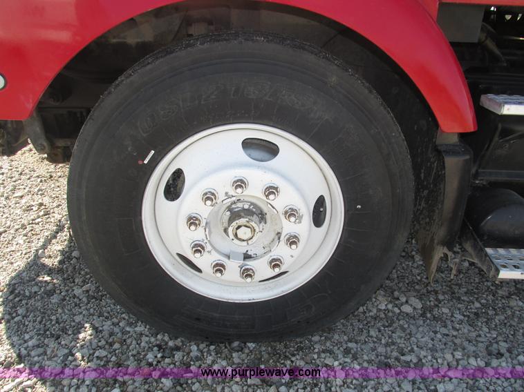 image for item H1179 2002 Volvo VNM water truck