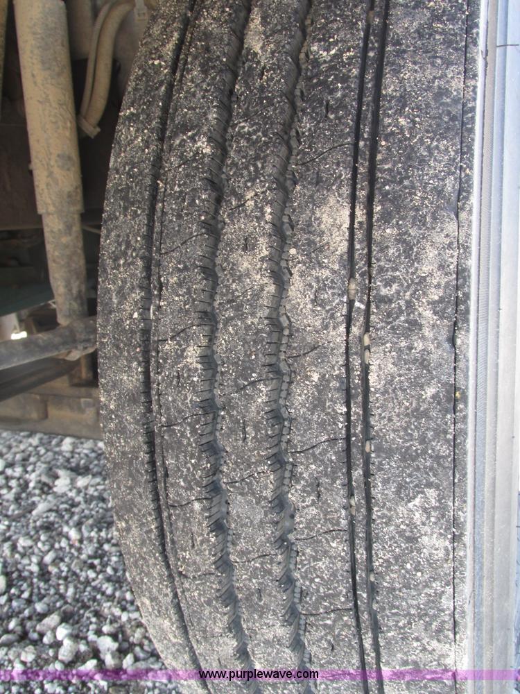 image for item H1179 2002 Volvo VNM water truck