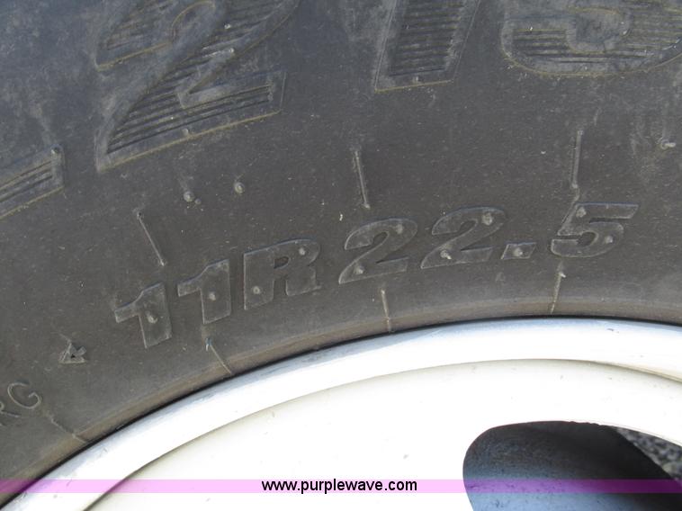 image for item H1179 2002 Volvo VNM water truck