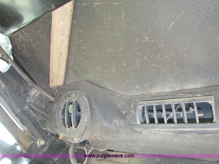 image for item H1218 2006 John Deere CT322 skid steer
