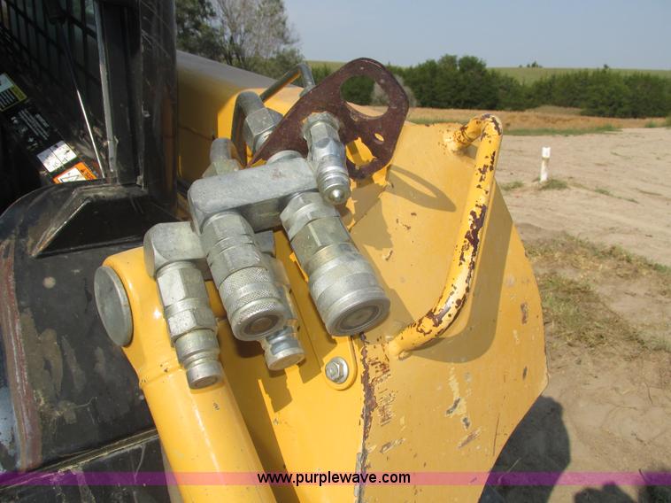 image for item H1218 2006 John Deere CT322 skid steer