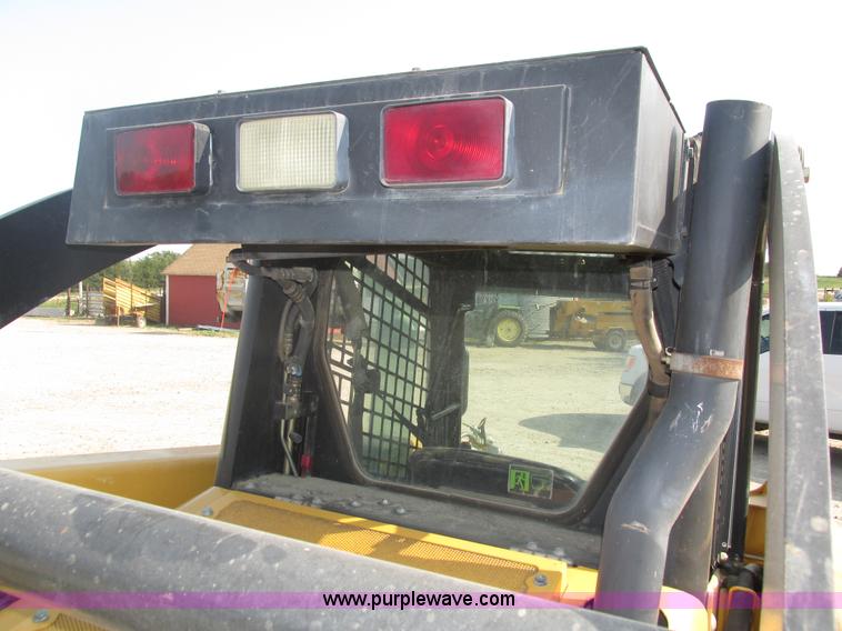 image for item H1218 2006 John Deere CT322 skid steer