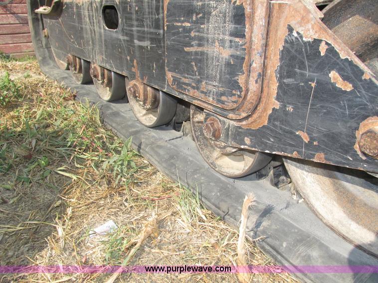 image for item H1218 2006 John Deere CT322 skid steer