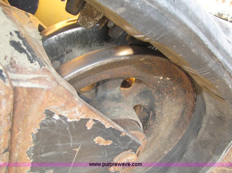 image for item H1218 2006 John Deere CT322 skid steer