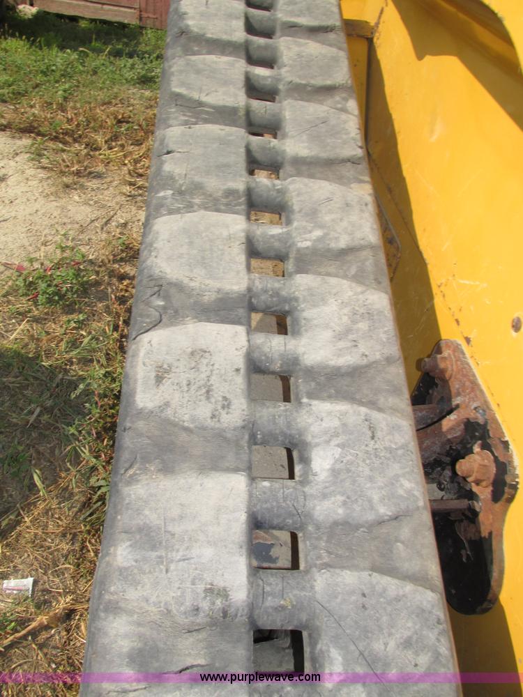 image for item H1218 2006 John Deere CT322 skid steer