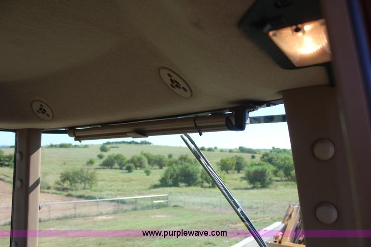 image for item J4475 2007 John Deere 9520 4WD tractor