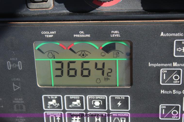 image for item J4475 2007 John Deere 9520 4WD tractor