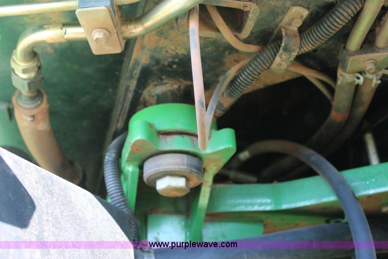 image for item J4475 2007 John Deere 9520 4WD tractor