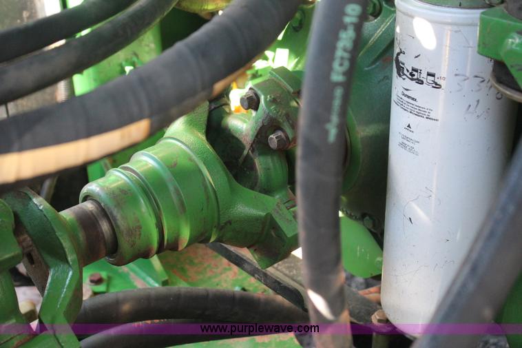 image for item J4475 2007 John Deere 9520 4WD tractor