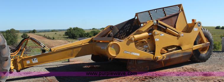image for item J4476 2005 John Deere 1810E pan scraper
