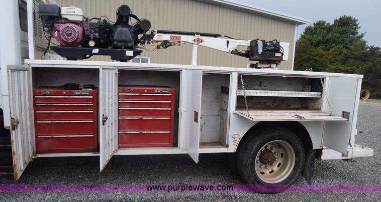 image for item J8192 1993 Freightliner FL70 service truck with crane