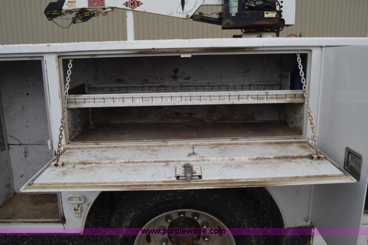 image for item J8192 1993 Freightliner FL70 service truck with crane