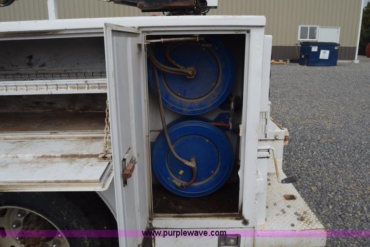 image for item J8192 1993 Freightliner FL70 service truck with crane