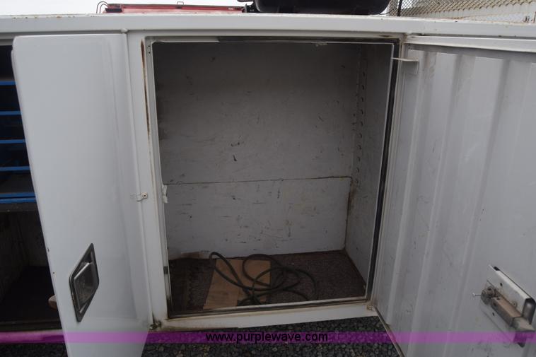 image for item J8192 1993 Freightliner FL70 service truck with crane