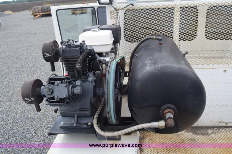 image for item J8192 1993 Freightliner FL70 service truck with crane