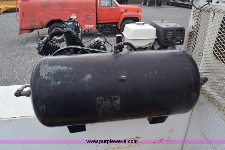 image for item J8192 1993 Freightliner FL70 service truck with crane