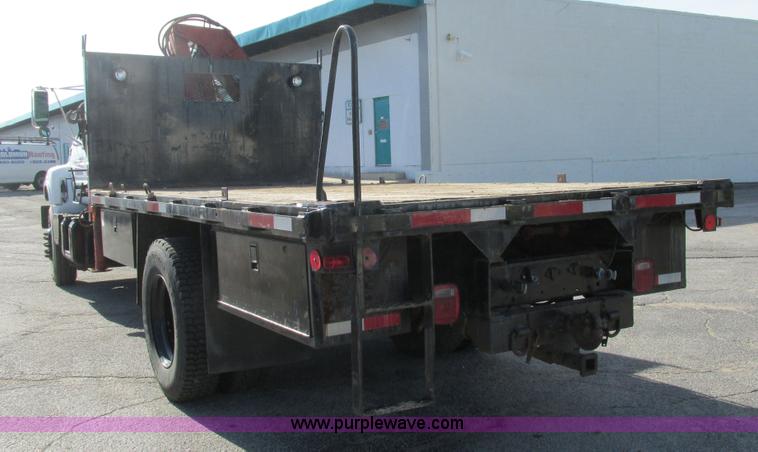 image for item K5094 1997 GMC C7500 flat bed truck with crane