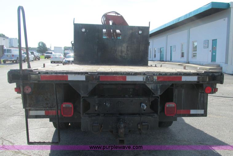 image for item K5094 1997 GMC C7500 flat bed truck with crane