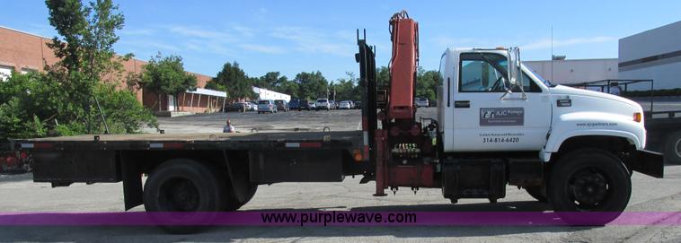 image for item K5094 1997 GMC C7500 flat bed truck with crane