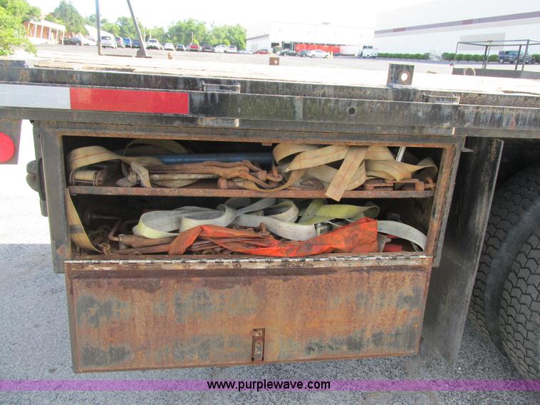 image for item K5094 1997 GMC C7500 flat bed truck with crane