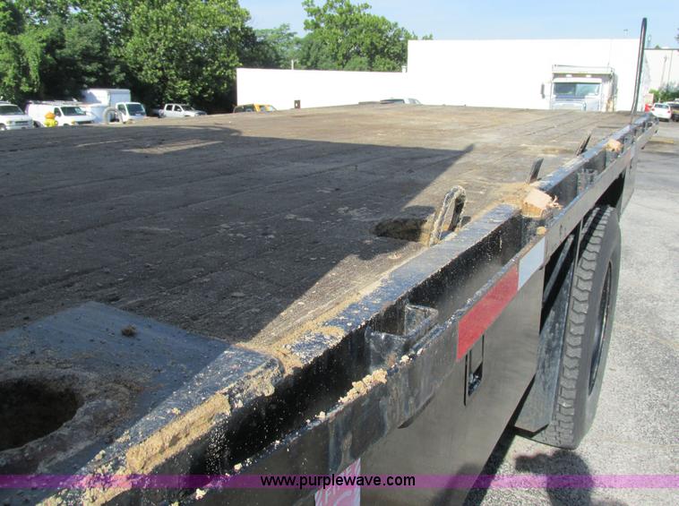 image for item K5094 1997 GMC C7500 flat bed truck with crane