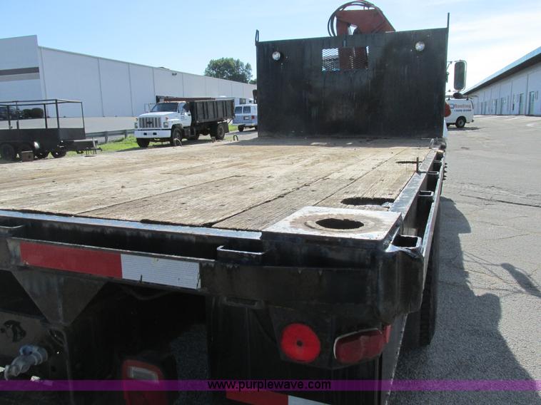 image for item K5094 1997 GMC C7500 flat bed truck with crane