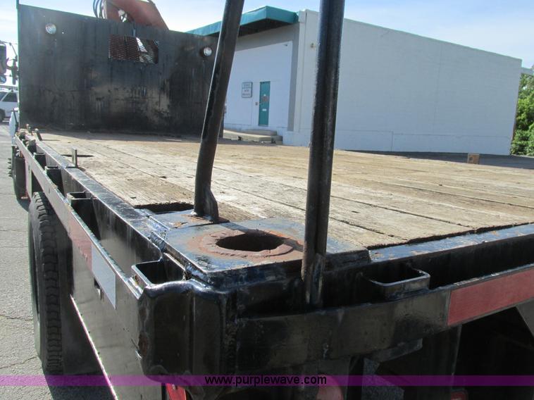 image for item K5094 1997 GMC C7500 flat bed truck with crane