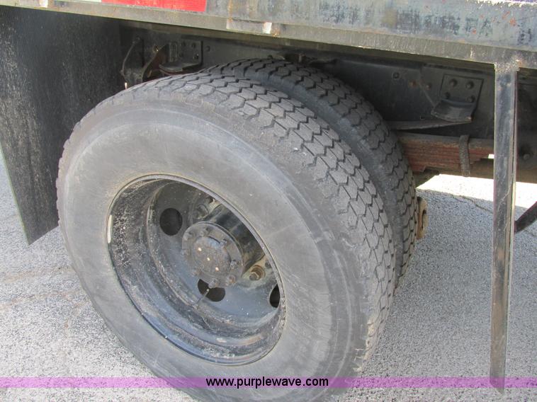 image for item K5094 1997 GMC C7500 flat bed truck with crane