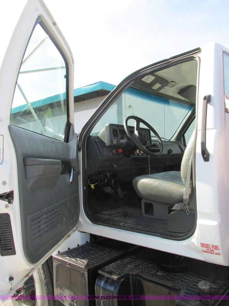 image for item K5094 1997 GMC C7500 flat bed truck with crane