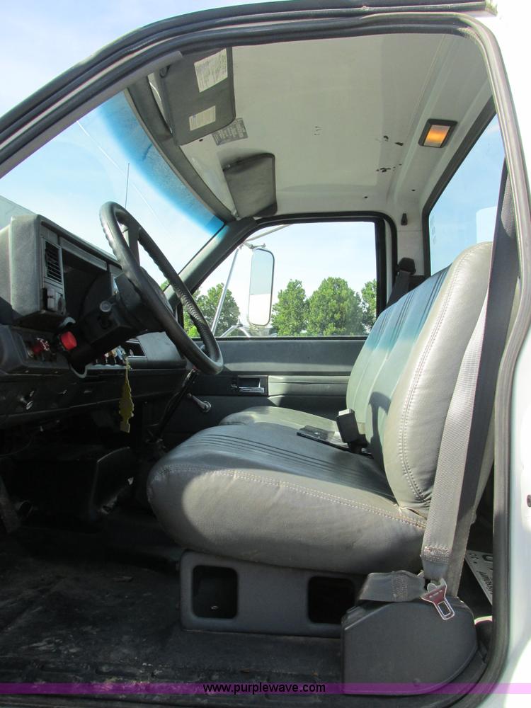 image for item K5094 1997 GMC C7500 flat bed truck with crane