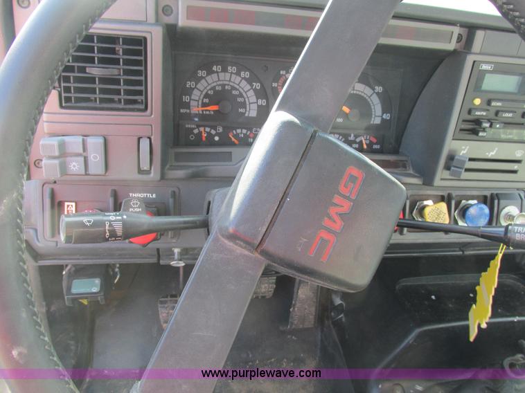 image for item K5094 1997 GMC C7500 flat bed truck with crane