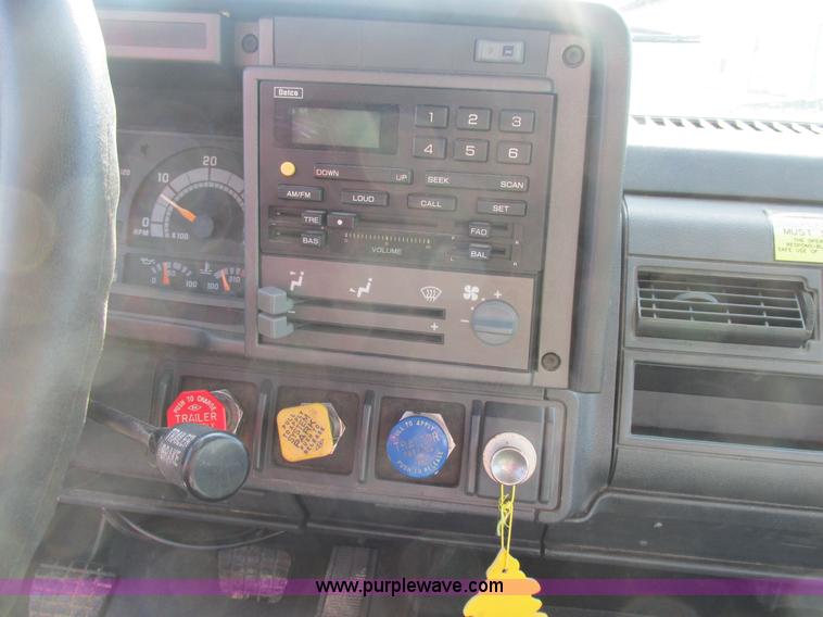 image for item K5094 1997 GMC C7500 flat bed truck with crane