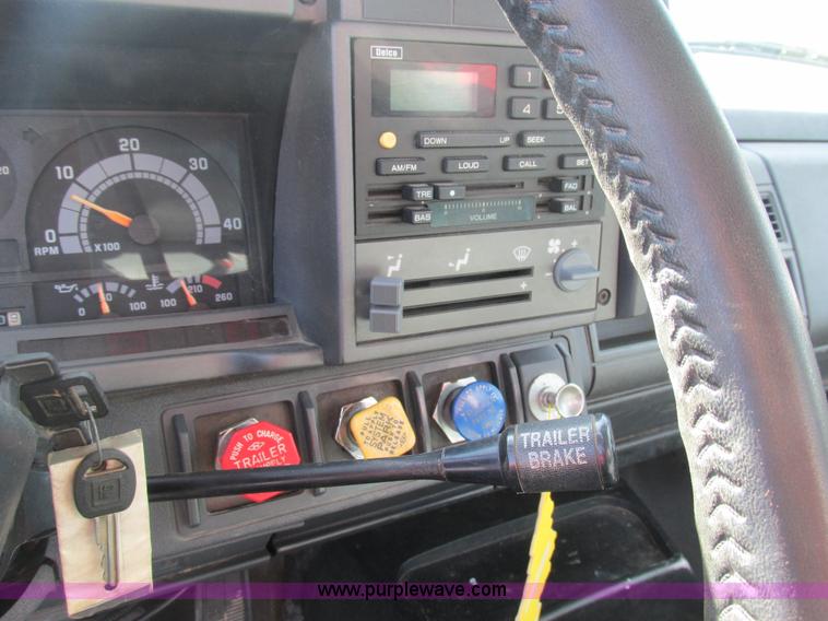 image for item K5094 1997 GMC C7500 flat bed truck with crane